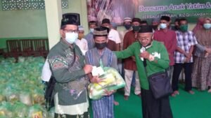Penyaluran bantuan anak yatim dan dhuafa