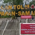 10 Tahun Menunggu Pembayaran Jalan Tol, Warga Bentangkan Spanduk Tuntutan Pembayaran