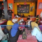 Jumat Berkah, RMC Gelar Makan Siang Gratis bagi Ojol dan Masyarakat Umum