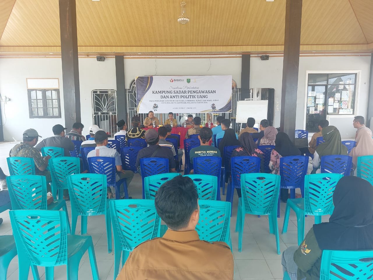 Wakapolsek Teluk Bayur Hadiri Sosialisasi Pembentukan Kampung Sadar Pengawasan dan Anti Politik Uang di Labanan Makmur