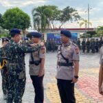 Dansat Brimob Pimpin Upacara Pengukuhan Wadanyon C Pelopor Serta Serah Terima Jabatan Kasubbagrenmin dan Kasi Intel